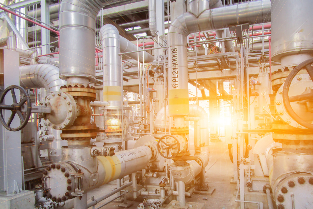 Image inside a process industry facility and the piping equipment within it.